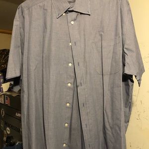 Short Sleeve, button down collar shirt.